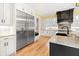 Spacious kitchen featuring stainless steel appliances, granite countertops, and custom cabinetry at 860 Chatham Hills Blvd, Westfield, IN 46074