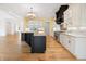 Modern kitchen featuring a large center island, stainless appliances, and custom cabinetry at 860 Chatham Hills Blvd, Westfield, IN 46074