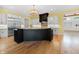 Modern kitchen with granite counters, stainless steel appliances, and a large center island at 860 Chatham Hills Blvd, Westfield, IN 46074