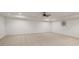 Spacious living room with neutral carpet and ceiling fan at 860 Chatham Hills Blvd, Westfield, IN 46074