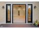 Open view of the room showcasing its spaciousness, ceiling fan and easy outdoor access at 860 Chatham Hills Blvd, Westfield, IN 46074