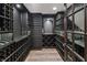 Custom wine cellar with wooden shelving and storage racks at 860 Chatham Hills Blvd, Westfield, IN 46074