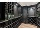 Elaborate custom wine cellar with wooden shelving at 860 Chatham Hills Blvd, Westfield, IN 46074