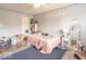 Bedroom featuring a double bed, wood floors, and double windows at 8712 Mellot Way, Camby, IN 46113