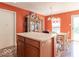 Eat-in kitchen features a wood floor, a small table, and plenty of cabinet space at 8712 Mellot Way, Camby, IN 46113