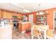 Well-equipped kitchen with ample counter space, updated appliances, and a cozy dining area at 8712 Mellot Way, Camby, IN 46113
