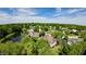 Aerial view of a charming neighborhood with mature trees and winding streets at 897 Copperwood Dr, Carmel, IN 46033