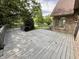 Large back deck overlooking a lush backyard at 897 Copperwood Dr, Carmel, IN 46033