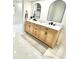 Stylish bathroom featuring double vanity and marble floors at 897 Copperwood Dr, Carmel, IN 46033