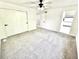 Bright bedroom with neutral carpet, ceiling fan and closet at 897 Copperwood Dr, Carmel, IN 46033