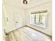 Bright bedroom with wood floors and a window providing natural light at 897 Copperwood Dr, Carmel, IN 46033