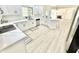 Modern kitchen with white cabinets, quartz countertops and stainless steel appliances at 897 Copperwood Dr, Carmel, IN 46033