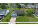 Charming single-story home featuring a well-manicured lawn and attached two-car garage at 905 Congressional Way, Shelbyville, IN 46176