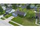 Inviting single-story home with a tidy front yard and attached two-car garage at 905 Congressional Way, Shelbyville, IN 46176