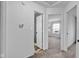 A hallway with doors that lead to different rooms at 905 Congressional Way, Shelbyville, IN 46176