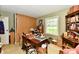 Bedroom with traditional wood furniture, closet, window and carpet. Plenty of storage is available at 9098 W 1050 N, Elwood, IN 46036