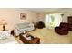 Cozy living room with comfortable seating, natural light, and a traditional ambiance at 9098 W 1050 N, Elwood, IN 46036