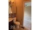 Bathroom features mosaic backsplash, dark wood cabinets, and updated fixtures at 9650 Copley Dr, Carmel, IN 46290