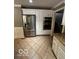 Modern kitchen featuring stainless steel appliances and a double oven at 9650 Copley Dr, Carmel, IN 46290