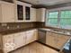Well-lit kitchen with granite countertops and modern stainless steel appliances at 9650 Copley Dr, Carmel, IN 46290