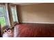 Bright living room with hardwood floors and large windows at 9650 Copley Dr, Carmel, IN 46290