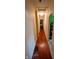 Hallway with hardwood floors and neutral walls that leads to bedrooms and other living spaces at 100 N 6Th Ave, Beech Grove, IN 46107