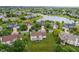 Wide aerial view showcasing the home's position within the surrounding community and pond at 1029 Bridgeport Dr, Westfield, IN 46074