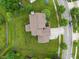Stunning aerial view of a home with a large, well-manicured lawn and mature trees at 1029 Bridgeport Dr, Westfield, IN 46074