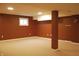Expansive basement area with brown walls, recessed lighting, and carpet flooring at 1029 Bridgeport Dr, Westfield, IN 46074