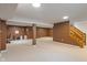 Spacious finished basement with open layout and neutral carpeting at 1029 Bridgeport Dr, Westfield, IN 46074