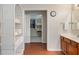 Bathroom featuring a tower of linens, vanity, and a doorway to the closet at 1029 Bridgeport Dr, Westfield, IN 46074