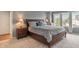 Well-lit bedroom featuring a plush bed and matching nightstands at 1029 Bridgeport Dr, Westfield, IN 46074