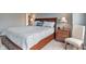 Bright bedroom features a plush bed and matching nightstands at 1029 Bridgeport Dr, Westfield, IN 46074