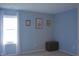 This bedroom is brightened by a window and features neutral paint and carpet at 1029 Bridgeport Dr, Westfield, IN 46074