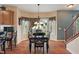 Dining area featuring hardwood floors, a bay window, and ample natural light at 1029 Bridgeport Dr, Westfield, IN 46074