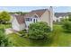 Aerial view of landscaped front yard featuring a well-maintained two-story home at 1029 Bridgeport Dr, Westfield, IN 46074