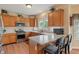 Kitchen with stainless steel appliances, counter seating, and natural light at 1029 Bridgeport Dr, Westfield, IN 46074