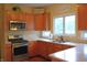 Functional kitchen featuring wood cabinets, stainless steel appliances, and ample countertop space at 1029 Bridgeport Dr, Westfield, IN 46074