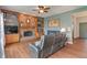 Comfortable living room with a fireplace, wooden floors, and cozy seating at 1029 Bridgeport Dr, Westfield, IN 46074
