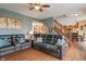 Spacious living room with cozy seating, hardwood floors, and an open floor plan at 1029 Bridgeport Dr, Westfield, IN 46074