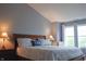 Spacious main bedroom features a large bed, lamps, and a window at 1029 Bridgeport Dr, Westfield, IN 46074