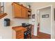 Built-in desk space near staircase with wooden floors and storage at 1029 Bridgeport Dr, Westfield, IN 46074