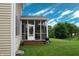 Side view of a screened patio with a grill on the lawn at 1029 Bridgeport Dr, Westfield, IN 46074