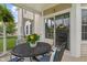 Relaxing screened patio featuring a table with seating and sliding glass door to the interior at 1029 Bridgeport Dr, Westfield, IN 46074