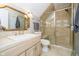 Bathroom featuring a glass shower with a built in seat, and marble countertops at 10627 Indian Lake S Blvd, Indianapolis, IN 46236