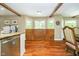 Bright dining area with hardwood floors, a breakfast nook, and natural light at 10627 Indian Lake S Blvd, Indianapolis, IN 46236
