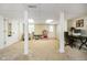 Finished basement gym area with exercise equipment, and office space at 10627 Indian Lake S Blvd, Indianapolis, IN 46236