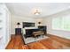 Spacious bedroom with elegant dark wood furniture and a tray ceiling at 10627 Indian Lake S Blvd, Indianapolis, IN 46236