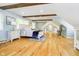Spacious bedroom featuring vaulted ceilings, exposed beams, and natural light at 10627 Indian Lake S Blvd, Indianapolis, IN 46236