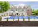 Resort-style backyard featuring a sparkling pool and a spacious deck at 10627 Indian Lake S Blvd, Indianapolis, IN 46236